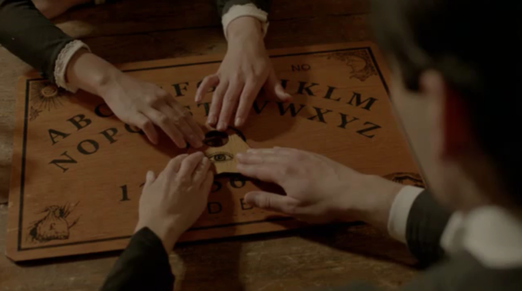 Gilded Spiritualism and Northern Lights - Downtown Abbey Ouija Board - The Social Diary