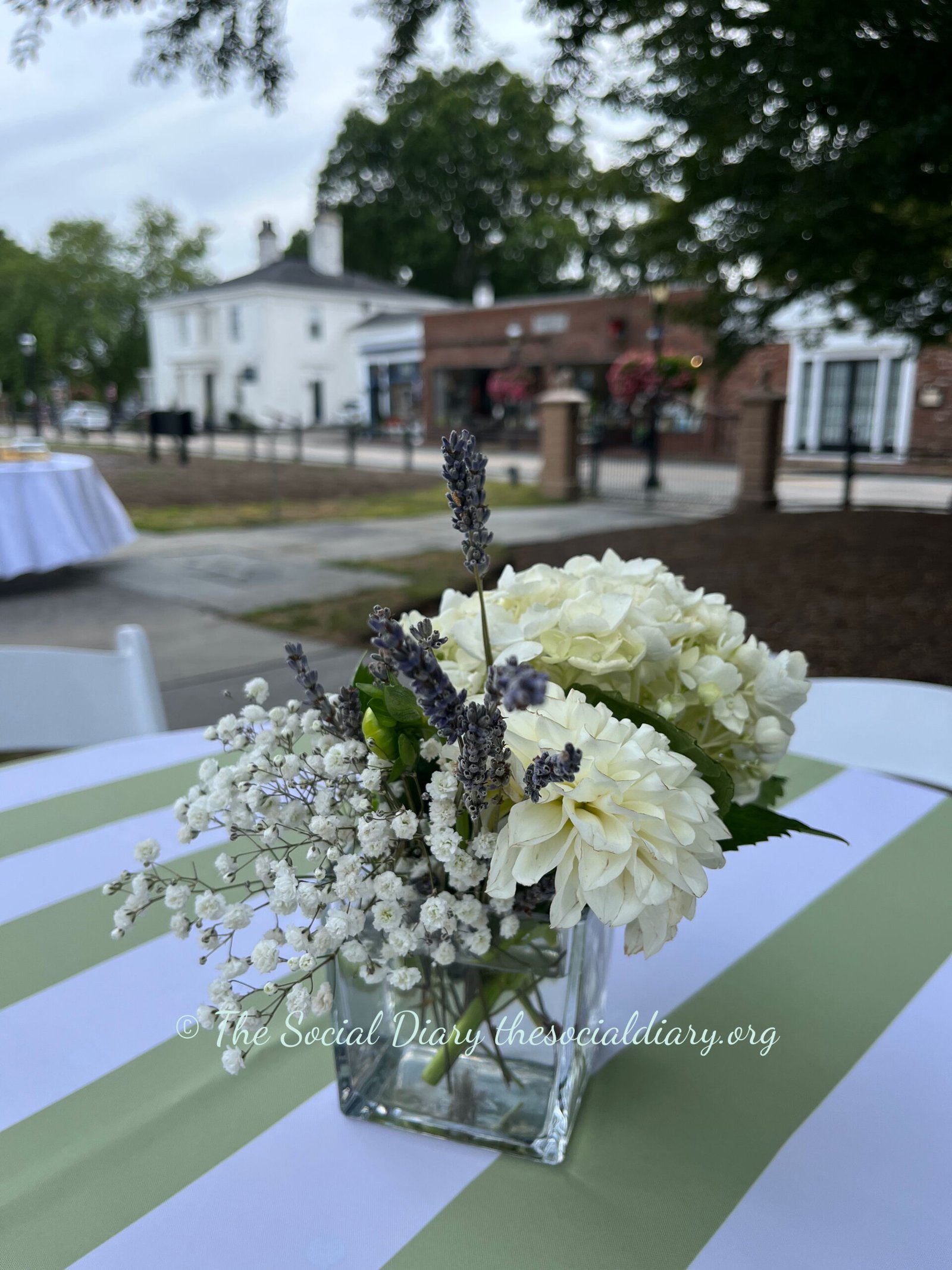 White floral garden party centrepiece - The Social Diary